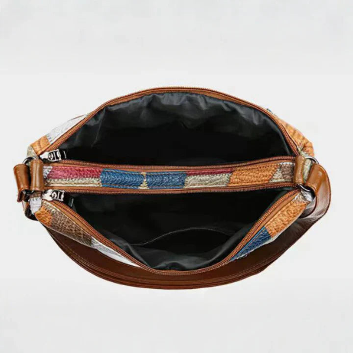 Bolso de mano de piel con mosaico